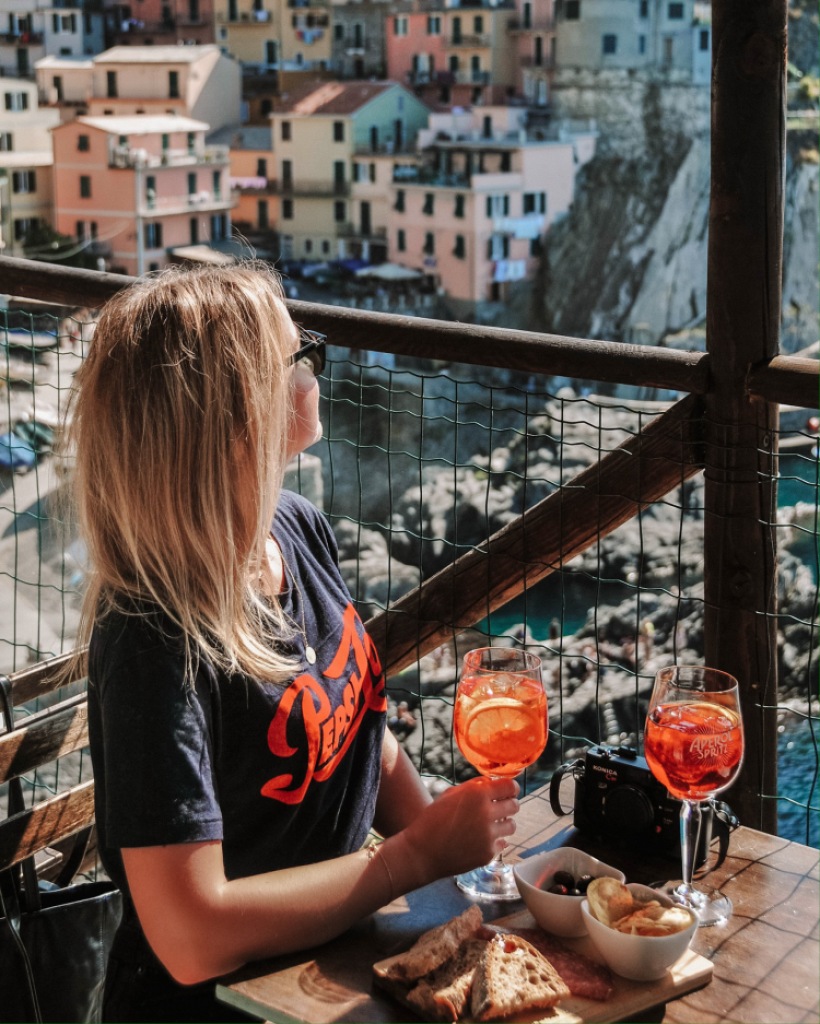 Having Aperol Spritz in Nessun Dorma, Cinque Terre, Italy